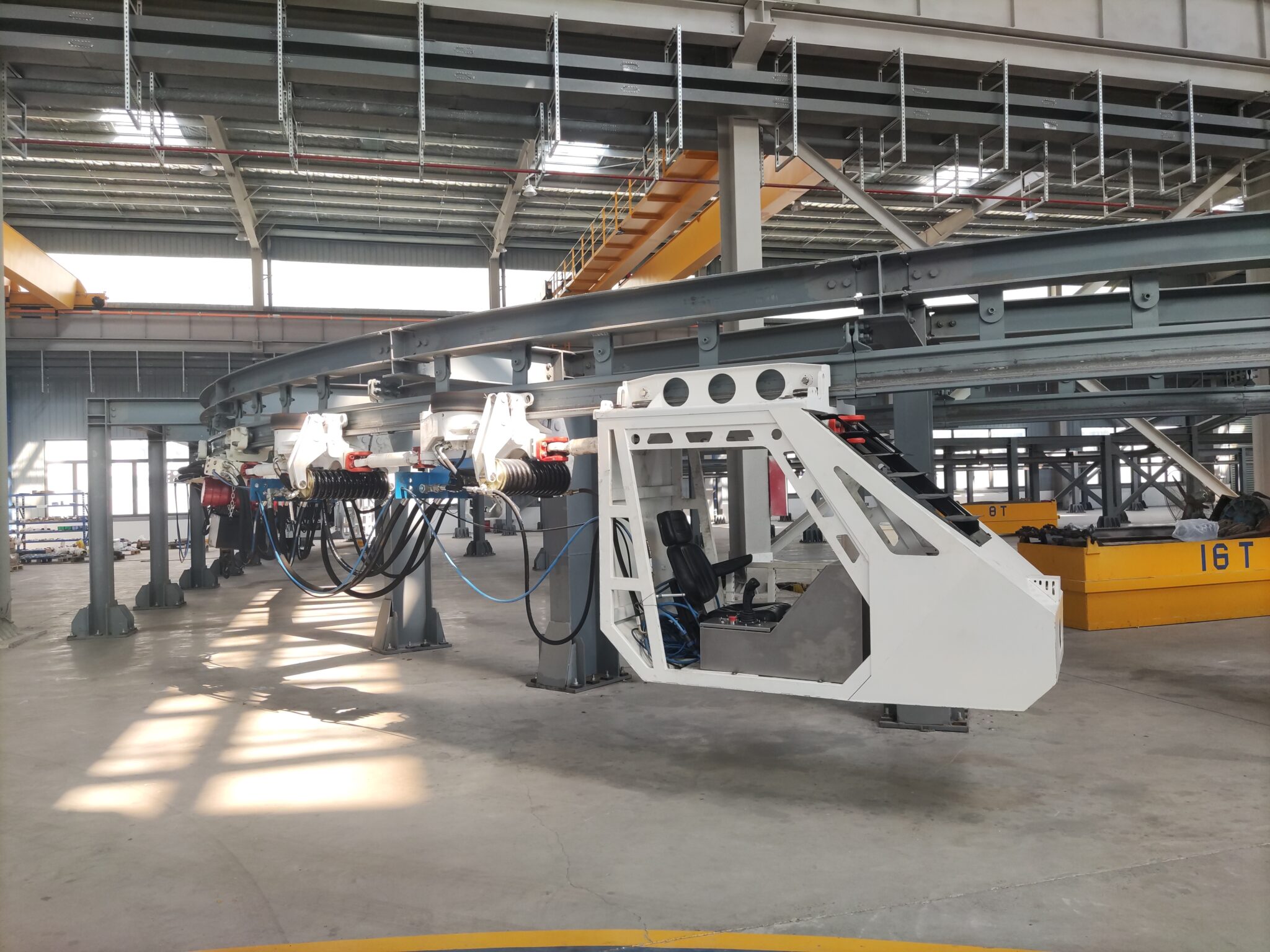 Suspended monorail transport locomotive